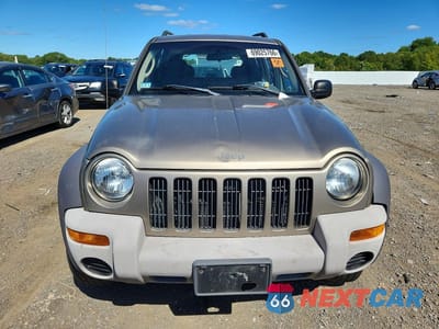 Piąte zdjęcie samochodu w środku: 2004 JEEP LIBERTY SPORT VIN:1J4GL48K44W315710 - miniatura