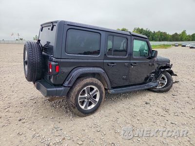 Trzecie zdjęcie samochodu z tyłu: 2019 JEEP WRANGLER UNLIMITED SAHARA VIN:1C4HJXEN4KW548130 - miniatura
