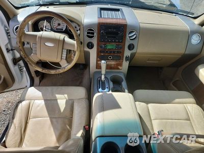 Zdjęcie 8 z 12 samochodu: 2004 FORD F150 LARIAT VIN:1FTPX14594NA45534 - miniatura