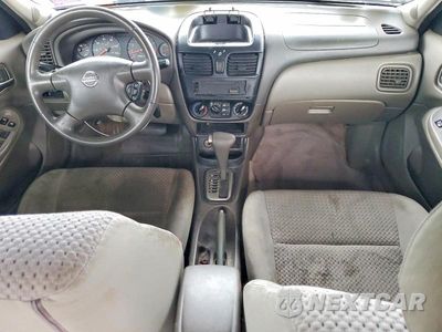 Zdjęcie 8 z 12 samochodu: 2004 NISSAN SENTRA 1.8 S VIN:3N1CB51A44L559249 - miniatura