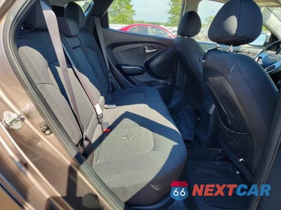 Zdjęcie 10 z 12 samochodu: 2010 HYUNDAI TUCSON GLS VIN:KM8JT3AC8AU083205 - miniatura
