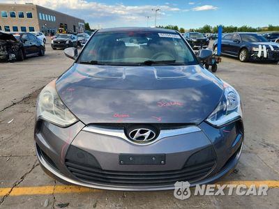 Piąte zdjęcie samochodu w środku: 2013 HYUNDAI VELOSTER BASE VIN:KMHTC6AD6DU179728 - miniatura