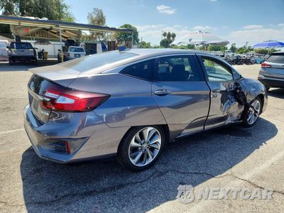 Trzecie zdjęcie samochodu z tyłu: 2018 HONDA CLARITY VIN:JHMZC5F13JC023279 - miniatura
