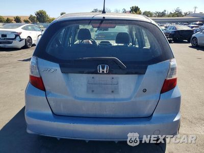 Zdjęcie 6 z 12 samochodu: 2009 HONDA FIT VIN:JHMGE88209S062809 - miniatura
