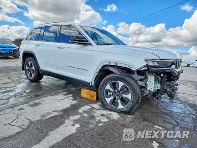 Czwarte zdjęcie samochodu z boku: 2022 JEEP GRAND CHEROKEE LIMITED 4XE VIN:1C4RJYB60N8717107 - miniatura