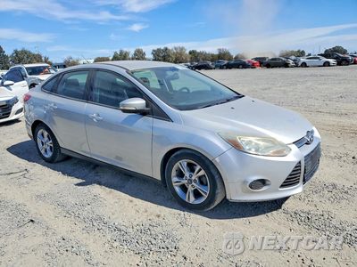 Czwarte zdjęcie samochodu z boku: 2014 FORD FOCUS SE VIN:1FADP3F25EL327500 - miniatura