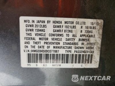 Zdjęcie 12 z 12 samochodu: 2013 HONDA FIT SPORT VIN:JHMGE8H50DC077887 - miniatura