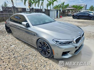 Czwarte zdjęcie samochodu z boku: 2019 BMW M5 VIN:WBSJF0C54KB284310 - miniatura