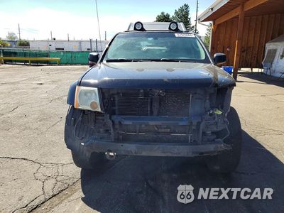 Piąte zdjęcie samochodu w środku: 2011 NISSAN XTERRA X VIN:5N1AN0NW5BC525104 - miniatura