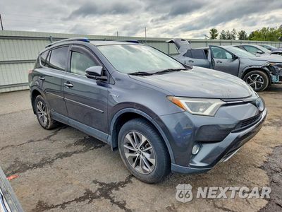 Czwarte zdjęcie samochodu z boku: 2017 TOYOTA RAV4 HYBRID XLE VIN:JTMRJREV1HD144559 - miniatura