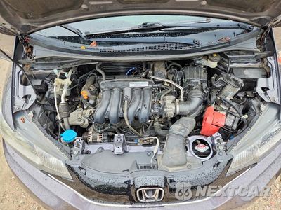 Zdjęcie 11 z 12 samochodu: 2016 HONDA FIT EX VIN:JHMGK5H76GX033821 - miniatura