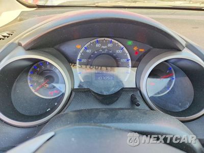 Zdjęcie 9 z 12 samochodu: 2009 HONDA FIT SPORT VIN:JHMGE88429S028629 - miniatura