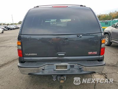 Zdjęcie 6 z 13 samochodu: 2005 GMC YUKON VIN:1GKEK13T15J153147 - miniatura
