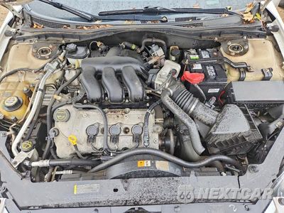Zdjęcie 11 z 12 samochodu: 2009 FORD FUSION SEL VIN:3FAHP08149R141216 - miniatura