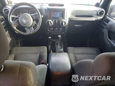 Zdjęcie 8 z 12 samochodu: 2012 JEEP WRANGLER UNLIMITED SPORT VIN:1C4HJWDGXCL182223 - miniatura