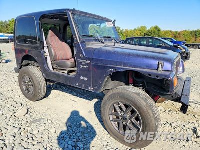 Czwarte zdjęcie samochodu z boku: 1999 JEEP WRANGLER / TJ SPORT VIN:1J4FY19S7XP475086 - miniatura