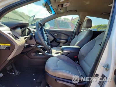 Zdjęcie 7 z 12 samochodu: 2014 HYUNDAI TUCSON GLS VIN:KM8JTCAF8EU950277 - miniatura