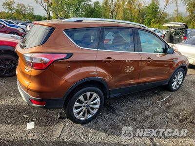 Trzecie zdjęcie samochodu z tyłu: 2017 FORD ESCAPE TITANIUM VIN:1FMCU9J9XHUE25356 - miniatura