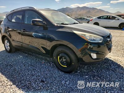 Czwarte zdjęcie samochodu z boku: 2014 HYUNDAI TUCSON SE VIN:KM8JU3AG7EU898131 - miniatura