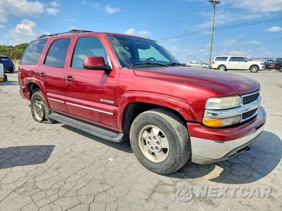 Czwarte zdjęcie samochodu z boku: 2002 CHEVROLET TAHOE C1500 VIN:1GNEC13Z82R238620 - miniatura