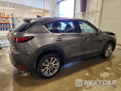 Trzecie zdjęcie samochodu z tyłu: 2021 MAZDA CX-5 GRAND TOURING VIN:JM3KFBDM3M1477156 - miniatura