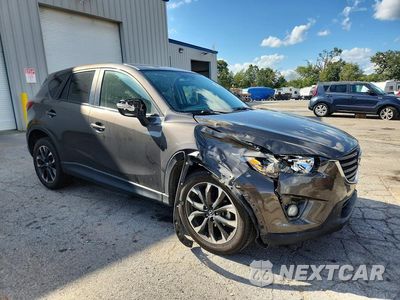 Czwarte zdjęcie samochodu z boku: 2016 MAZDA CX-5 GT VIN:JM3KE4DY6G0851416 - miniatura