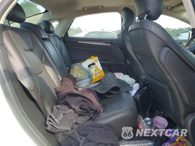 Zdjęcie 10 z 12 samochodu: 2014 FORD FUSION TITANIUM VIN:3FA6P0K97ER326859 - miniatura
