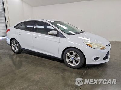 Czwarte zdjęcie samochodu z boku: 2013 FORD FOCUS SE VIN:1FADP3F26DL195281 - miniatura
