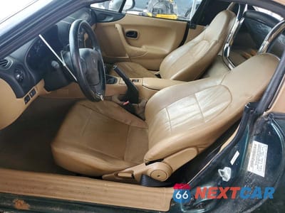Zdjęcie 7 z 12 samochodu: 2000 MAZDA MX-5 MIATA BASE VIN:JM1NB3533Y0140186 - miniatura