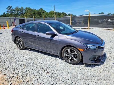 Czwarte zdjęcie samochodu z boku: 2017 HONDA CIVIC TOURING VIN:19XFC1F95HE008742 - miniatura
