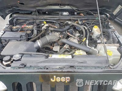 Zdjęcie 12 z 13 samochodu: 2011 JEEP WRANGLER UNLIMITED SAHARA VIN:1J4BA5H18BL633972 - miniatura