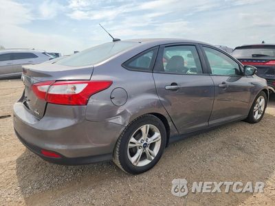 Trzecie zdjęcie samochodu z tyłu: 2014 FORD FOCUS SE VIN:1FADP3F27EL153686 - miniatura