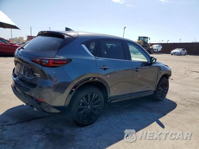 Trzecie zdjęcie samochodu z tyłu: 2022 MAZDA CX-5 VIN:JM3KFBAY7N0595273 - miniatura