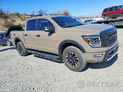 Czwarte zdjęcie samochodu z boku: 2023 NISSAN TITAN PRO-4X VIN:1N6AA1ED5PN118686 - miniatura