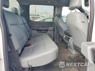 Zdjęcie 10 z 12 samochodu: 2023 FORD F150 LIGHTNING PRO VIN:1FTVW1EL4PWG44038 - miniatura