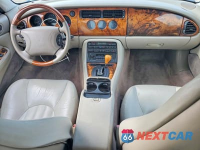 Zdjęcie 8 z 12 samochodu: 1997 JAGUAR XK8 VIN:SAJGX5743VC003434 - miniatura