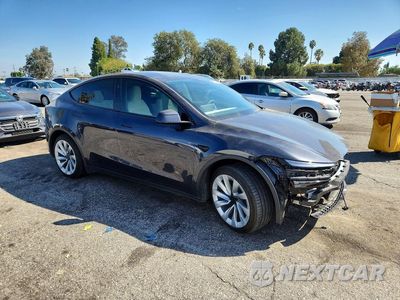 Czwarte zdjęcie samochodu z boku: 2026 TESLA MODEL Y VIN:7SAYGDEE3TF565779 - miniatura