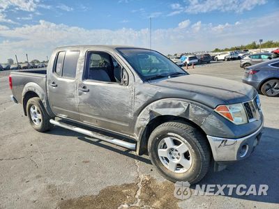 Czwarte zdjęcie samochodu z boku: 2007 NISSAN FRONTIER SE VIN:1N6AD07U27C445881 - miniatura