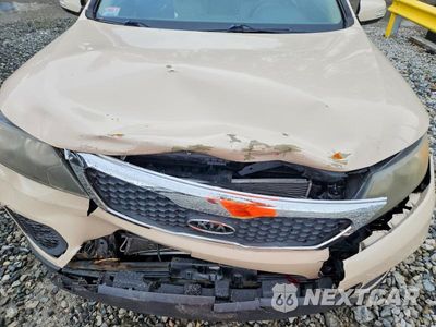 Zdjęcie 12 z 13 samochodu: 2012 KIA SORENTO LX VIN:5XYKT3A11CG194528 - miniatura