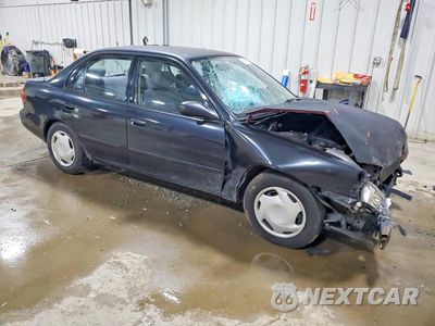 Czwarte zdjęcie samochodu z boku: 2000 CHEVROLET GEO PRIZM BASE VIN:1Y1SK5283YZ406246 - miniatura