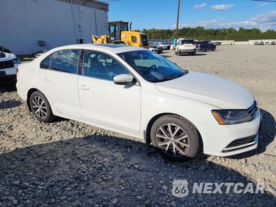 Czwarte zdjęcie samochodu z boku: 2017 VOLKSWAGEN JETTA SE VIN:3VWDB7AJ4HM242744 - miniatura