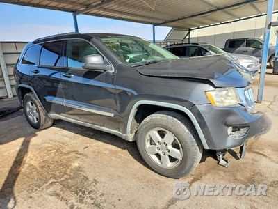 Czwarte zdjęcie samochodu z boku: 2011 JEEP GRAND CHEROKEE LAREDO VIN:1J4RS4GG5BC564265 - miniatura