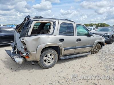 Trzecie zdjęcie samochodu z tyłu: 2003 CHEVROLET TAHOE C1500 VIN:1GNEC13V23R309177 - miniatura