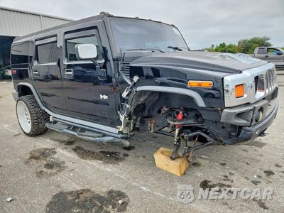 Czwarte zdjęcie samochodu z boku: 2004 HUMMER H2 VIN:5GRGN23U14H101743 - miniatura