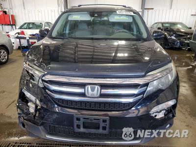 Piąte zdjęcie samochodu w środku: 2017 HONDA PILOT TOURING VIN:5FNYF6H98HB037494 - miniatura