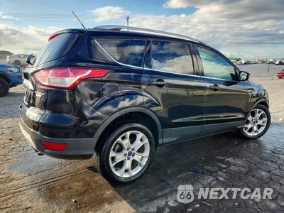 Trzecie zdjęcie samochodu z tyłu: 2016 FORD ESCAPE TITANIUM VIN:1FMCU9J98GUC07706 - miniatura