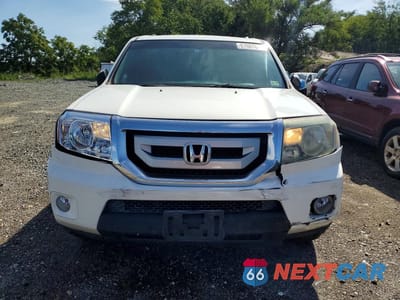 Piąte zdjęcie samochodu w środku: 2011 HONDA PILOT EXL VIN:5FNYF3H68BB008363 - miniatura