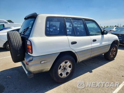 Trzecie zdjęcie samochodu z tyłu: 2000 TOYOTA RAV4 BASE VIN:JT3HP10V9Y0229826 - miniatura