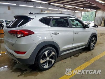 Trzecie zdjęcie samochodu z tyłu: 2018 HYUNDAI TUCSON LIMITED VIN:KM8J3CA28JU620260 - miniatura