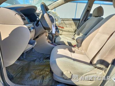 Zdjęcie 7 z 12 samochodu: 2004 TOYOTA COROLLA LE VIN:1NXBR32E04Z330708 - miniatura